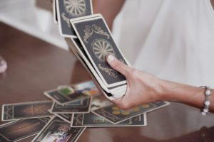 Woman Shuffling Tarot Cards